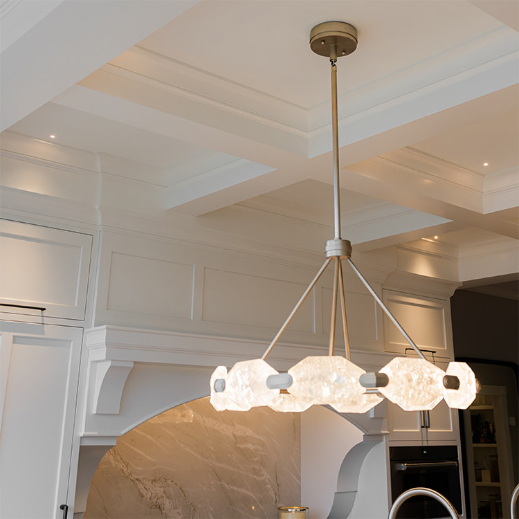PMV - Project Highlight - Contemporary Lakehouse Kitchen and Dining Room 1 Freshly painted kitchen with a round chandelier.