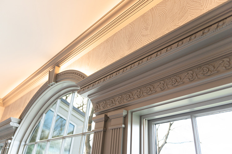 PMV - Project Highlight - Contemporary Lakehouse Living Areas Entertainment 2 Close up of freshly painted decorative detailed trim work.