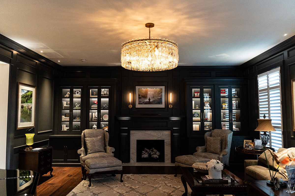 PMV - Project Highlight - Contemporary Lakehouse Living Areas Library 1 Dark and moody home library with fireplace.